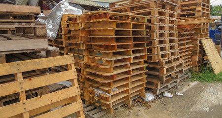 stack pile of wooden pallet in old factory