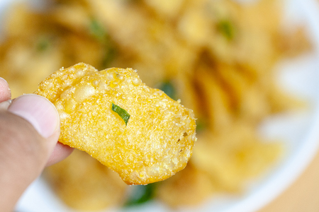 close up of salted egg potato chips on plateの写真素材
