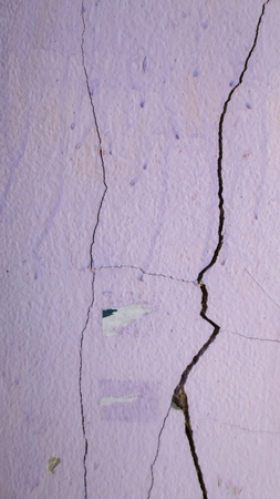 close up of broken purple concrete pole in school at Thailandの写真素材