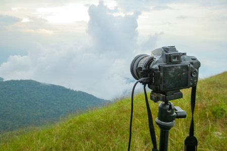 Camera on tripod Photographers take photo at Doi Mon Jong, a popular mountain near Chiang Mai, Thailandの写真素材