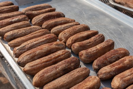 row of dried banana on sunny day at thailandの写真素材