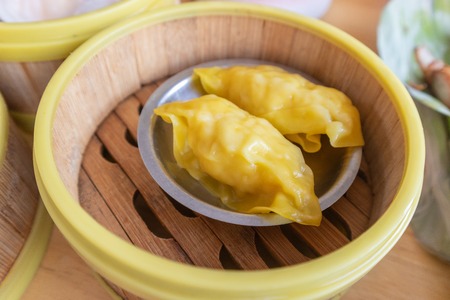 shrimp Dim Sum dumplings in bamboo basketの写真素材