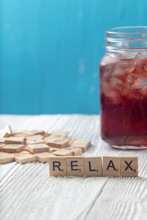 close up of iced pomegranate juice in glass on the tableの写真素材