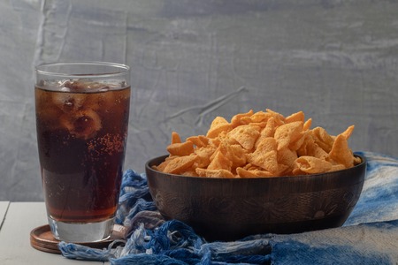 crunchy corn cones snack on wooden bowl