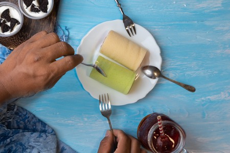 pandan swiss roll cake and strawberry swiss roll cakeの写真素材