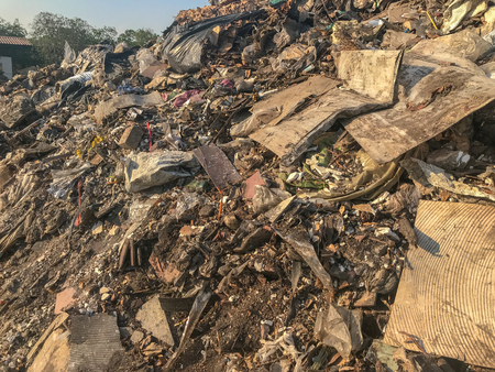 pile of old dirty garbage in construction site