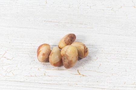 boiled jack fruit seed on wooden bowl