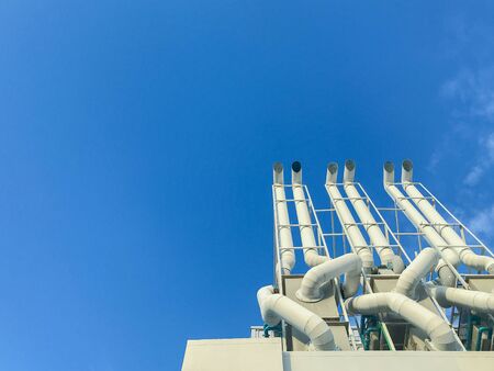 pipeline oil refinery and chimney plant factoryの写真素材