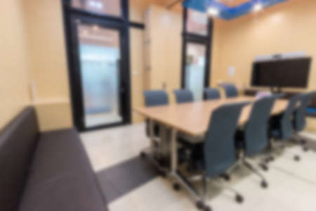 Blurry abstract background of empty modern boardroom, meeting office room