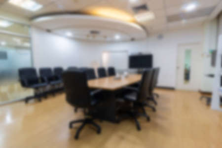 Blurry abstract background of empty modern boardroom, meeting office room