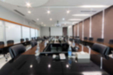 Blurry abstract background of empty modern boardroom, meeting office room