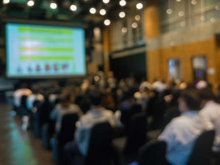 Abstract blurred video camera in seminar room