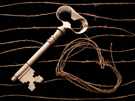 key and heart from lace on dark backgroundの写真素材