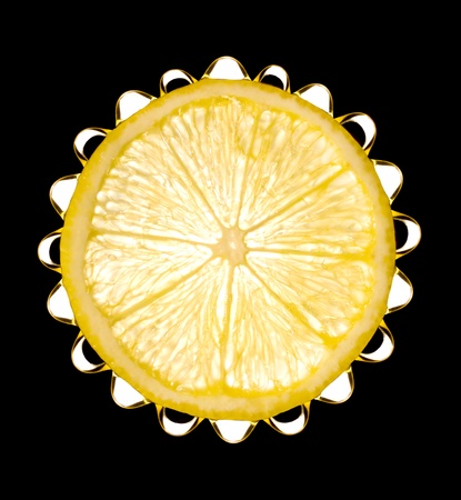 cut of  lemon with drop of water on dark backgroundの写真素材