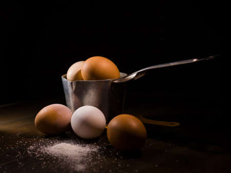 Eggs in the old-fashion metal bowl