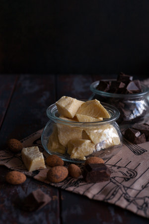 Cocao butter and raw choclate in glass jars.の写真素材