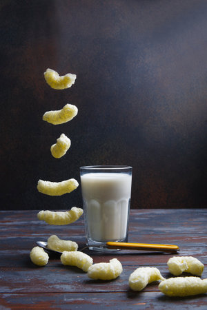 Breakfast with corn puffs and milk.の写真素材