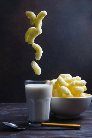 Breakfast with corn puffs and milk.