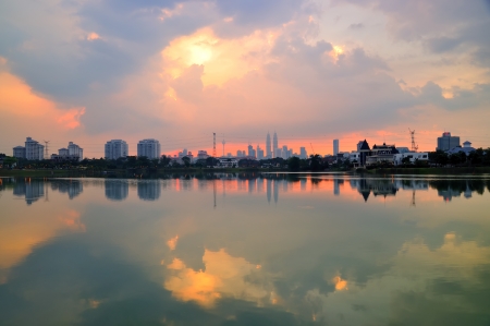 Reflection of Kuala Lumpur cityscape at sunsetの写真素材