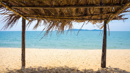 Seaview from inside a bamboo hut at the beachの写真素材