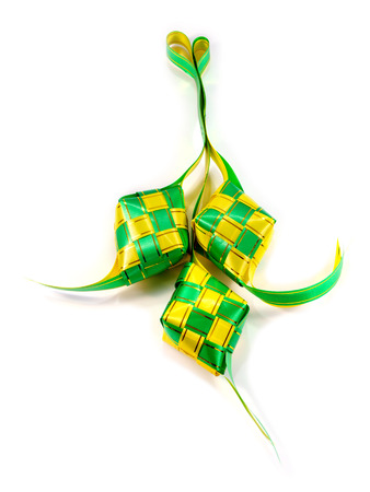 Ketupat (Rice Dumpling) on white background for decoration. Ketupat is a traditional casing for cooking rice during Eid Mubarak in Malaysia.の写真素材