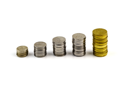 Stacks of coins on white background
