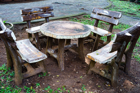 Concrete chairs and table in the gardenの写真素材