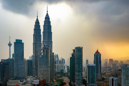 KUALA LUMPUR, MALAYSIA - FEBRUARY 22,2016 : Beautiful dramatic sunset over Kuala Lumpur city skyline, the capital city of Malaysia.のeditorial素材