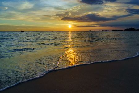 Beautiful majestic sunset by the beachの写真素材