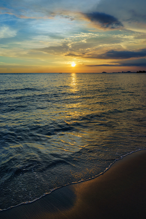 Beautiful majestic sunset by the beachの写真素材