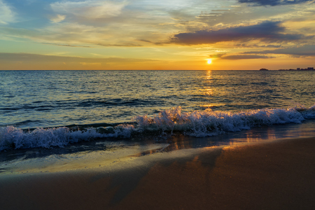 Beautiful majestic sunset by the beachの写真素材