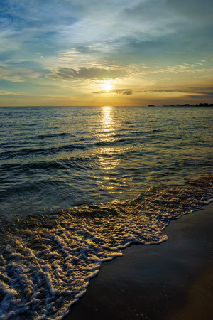 Beautiful majestic sunset by the beachの写真素材