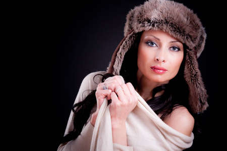 Attractive girl in winter fur hat