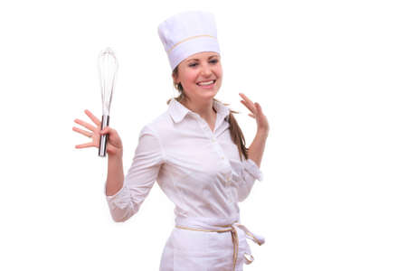 Beautiful young woman cooking isolated white backgroundの写真素材