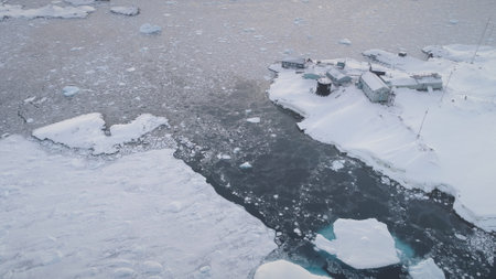 Antarctic Vernadsky Station Aerial Zoom Timelapse. Ocean Coast Open Water Surface. South Pole...