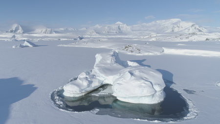 Melting Ice - Iceberg Frozen. Antarctica Aerial View Climate Change. Antarctic Winter Glacier in...