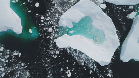 Antarctica Iceberg Turquoise Lake Aerial Top Down View. Big Majestic Blue Ice Glacier Melting in...