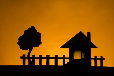 The House ,tree and sunset.の写真素材