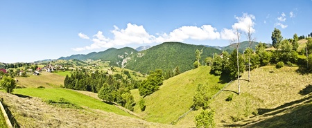 Panorama background in Carpathians. Beautiful mountains and landscape in Romania.の写真素材