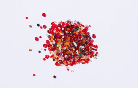 close up of colorful beads on a white background,pile of colorful beads.の写真素材
