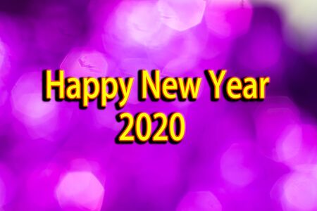 happy new year 2020 with pink bokeh background.yellow text with black shade.