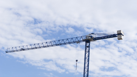 Crane / Cranes on Blue Sky With Clouds for Construction Advertising Designの写真素材