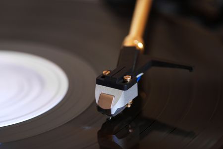 Details of a Vilyl palyer with a record spinning round. の写真素材