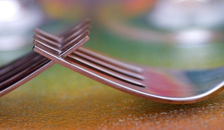 Two spoons with minimum DoF over a colorful background の写真素材