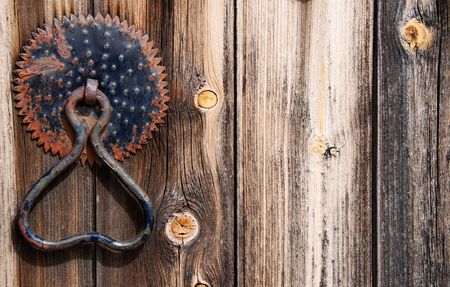                                     Wooden old door with vintage door handle の写真素材