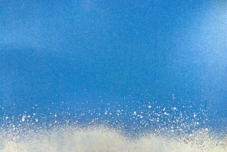 Blue background from a metalic rusty surfaceの写真素材