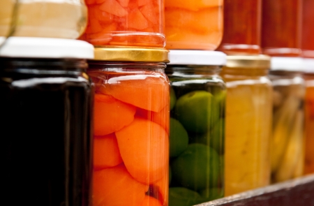 Bottles of homemade fruit sweets の写真素材