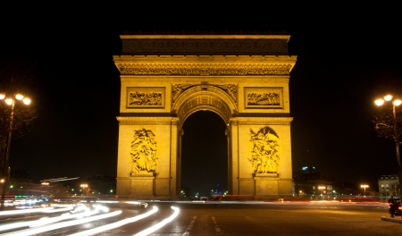 Arch de triumph in Paris, France with car lights  during night.のeditorial素材