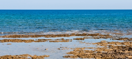 Coastal landscape with sea water and rocks の写真素材