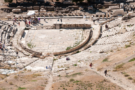 Athens, Greece - August 31: Theatre of Dionysus, from Acropolis Hill with tourists walking around on August 31, 2014  in Athens Greeceのeditorial素材